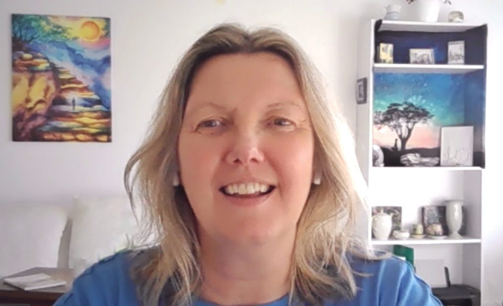 Kristina Day, founder of Conscious Wisdom Tech, laughing warmly in a candid portrait